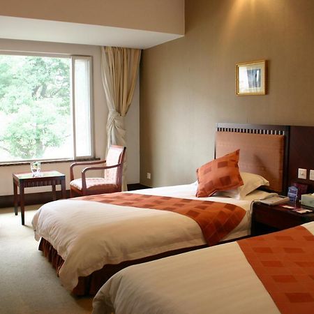 Suzhou Taoyuan International Holiday Hotel Suzhou (Jiangsu) Quarto foto
