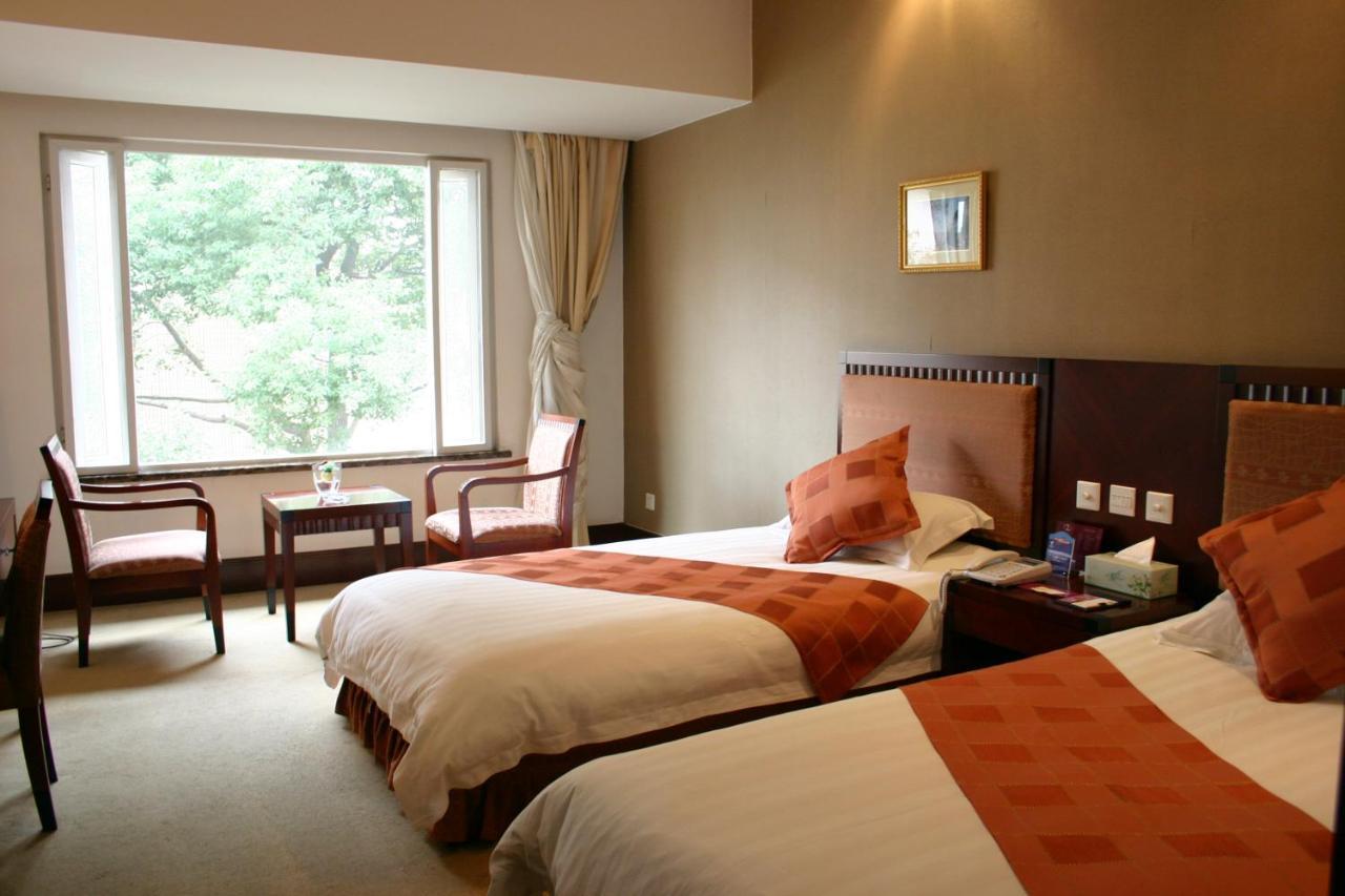 Suzhou Taoyuan International Holiday Hotel Suzhou (Jiangsu) Quarto foto